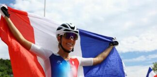 Cycling-All smiles now for golden Frenchwoman Ferrand-Prevot