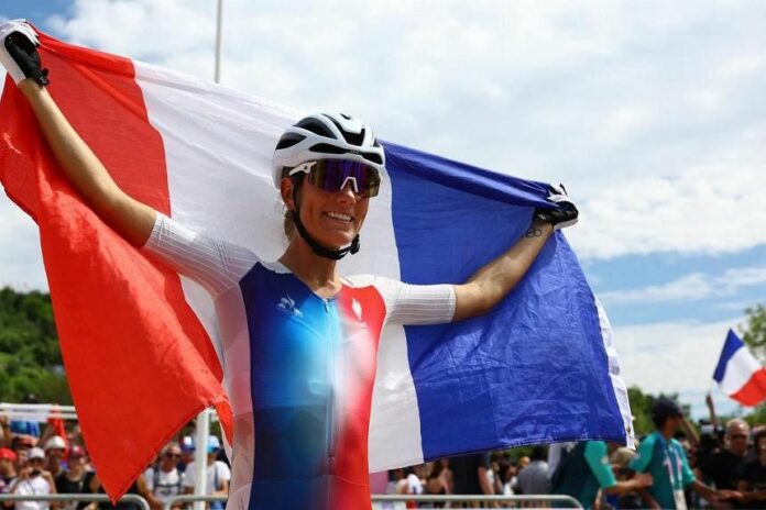 Cycling-All smiles now for golden Frenchwoman Ferrand-Prevot