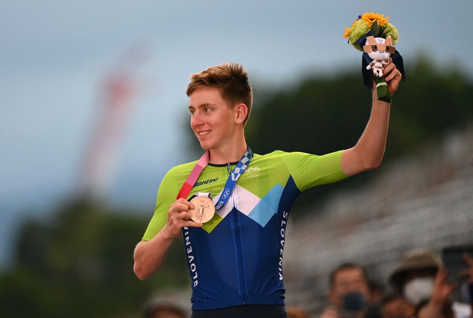 Bronze medallist Slovenia's Tadej Pogacar celebrates on the podium during the medal ceremony for the men's cycling road race of the Tokyo 2020 Olympic Games, at the Fuji International Speedway in Oyama, Japan, on July 24, 2021.