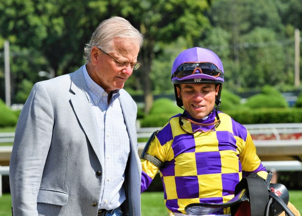 Joel Rosario (right) and Bill Mott (left) at Saratoga. (PHOTO...