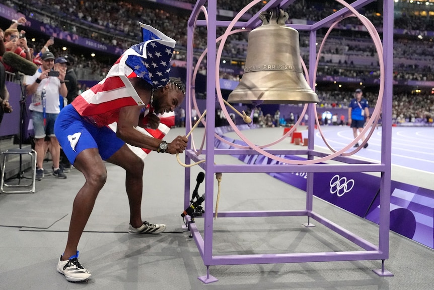 Noah Lyles, of the United States, celebrates after winning the men's 100-meters final.