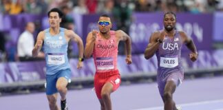 Andre De Grasse competes in the 200m heats on Monday.