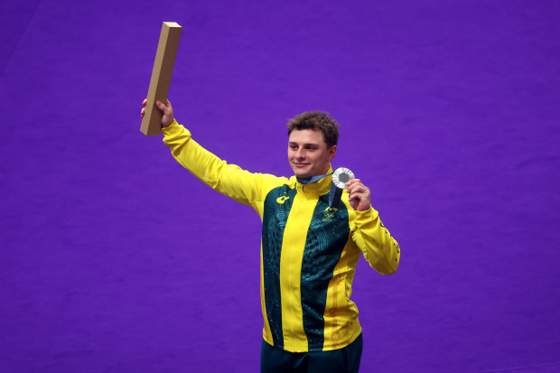 Silver medalist Matthew Richardson of Team Australia celebrates at podium after the Men's Sprint, Finals on day fourteen of the Olympic Games Paris 2024 at Saint-Quentin-en-Yvelines Velodrome on August 09, 2024 in Paris, France. (Photo by Jared C. Tilton/Getty Images)