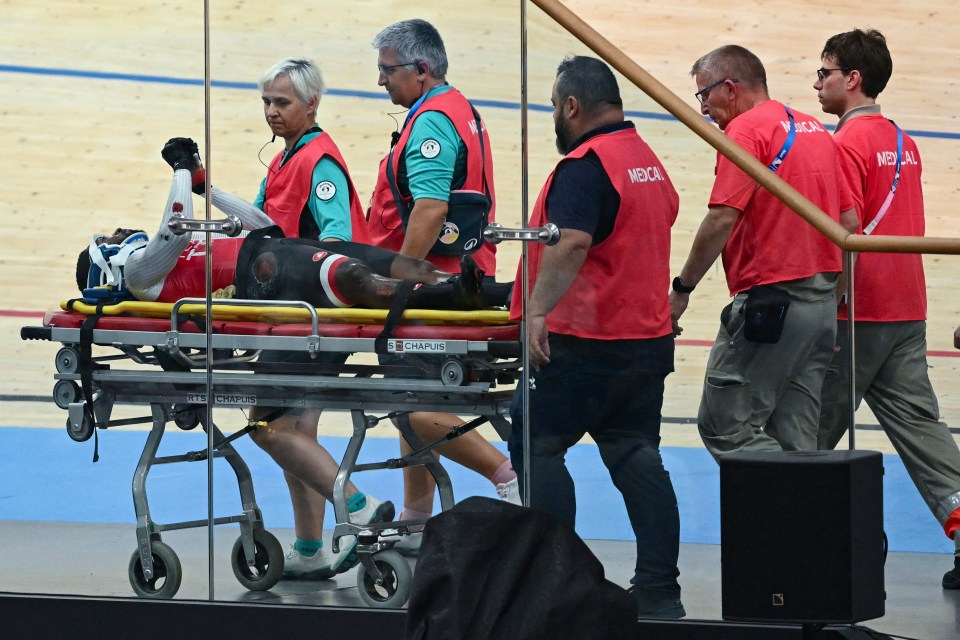 The Olympian was then stretchered out of the arena and was thankfully seen moving