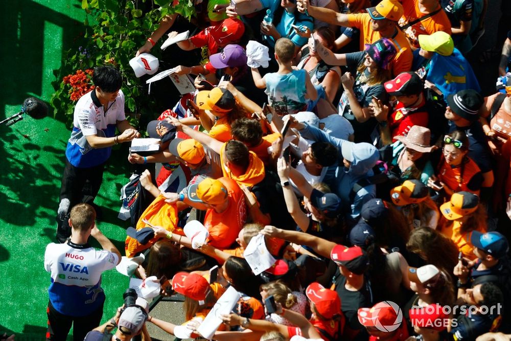 Yuki Tsunoda, Visa Cash App RB F1 Team, signs autographs for fans