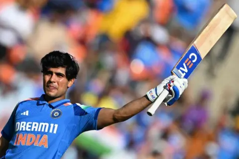 AFP India's Shubman Gill celebrates after scoring a century (100 runs) during the third one-day international (ODI) cricket match between India and England at the Narendra Modi Stadium in Ahmedabad on February 12, 2025.