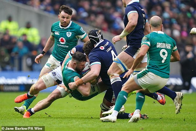 Jonny Gray helps bring Ireland's Calvin Nash to a sudden halt at Murrayfield this year