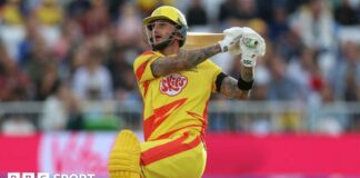 Alex Hales of Nottinghamshire sends the ball to the boundary