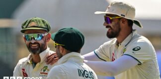 Australia's Nathan Lyon, Josh Inglis and Mitchell Starc celebrate wickets