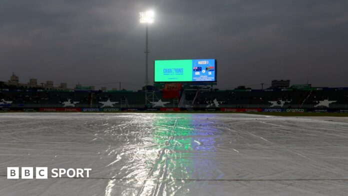 A general view of the covers on the pitch during the Australia-South Africa game at the Champions Trophy in Rawalpindi