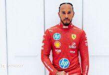 Lewis Hamilton wears the red Ferrari race suit for the first time 