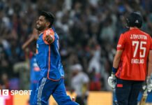 India's Harshit Rana celebrates the wicket of England's Jamie Overton in the fourth T20 in Pune