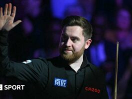 Jak Jones waves to the crowd