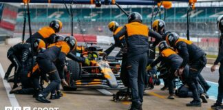 McLaren crew tend to Lando Norris in the new 2025 car at Silverstone 