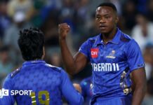 MI Cape Town's Kagiso Rabada celebrates a wicket with Rashid Khan