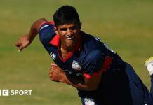 Nosthush Kenjige of USA bowls