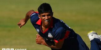 Nosthush Kenjige of USA bowls