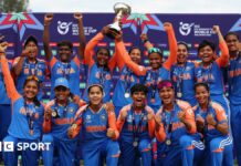 India players celebrate with the trophy after winning the 2025 Women's Under-19 T20 World Cup, beating South Africa in the final in Kuala Lumpur