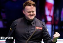 Shaun Murphy celebrates claiming a 147 break against Mark Allen at the 2025 Masters