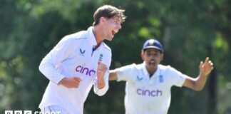 Archie Vaughan celebrates taking a wicket for England U19s