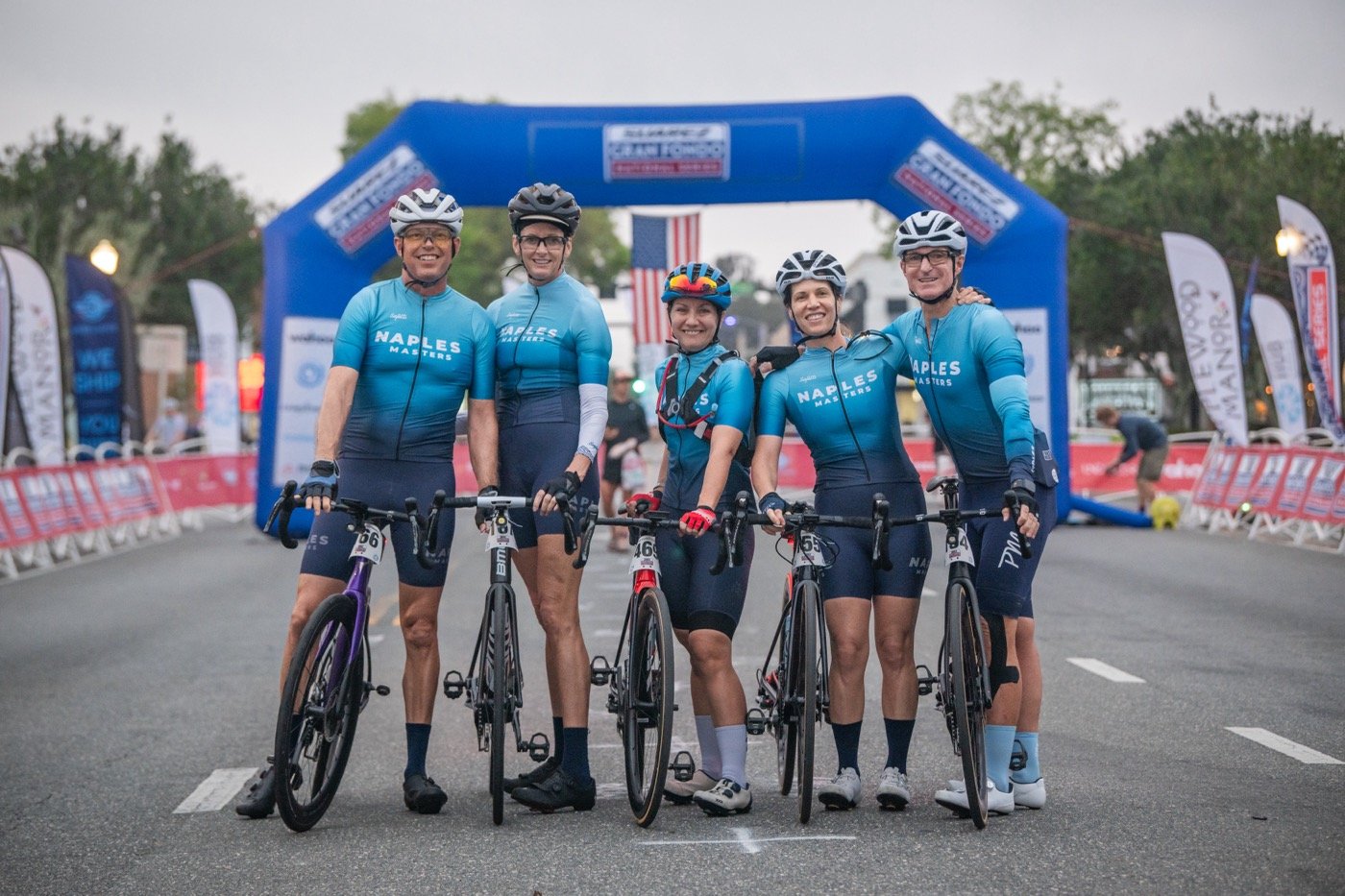 Riders pose for a photograph at the end of the Gran Fondo Florida