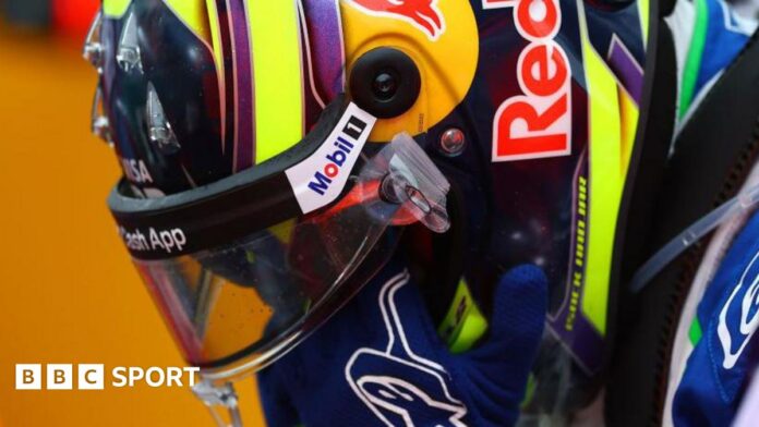 Racing Bulls' Isack Hadjar has his hands on his head at the Australian Grand Prix