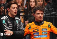 Lando Norris of McLaren and George Russell of Mercedes talking after race at the 2025 Australian Grand Prix