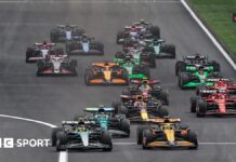 Lewis Hamilton leads Lando Norris into the first corner during the 2024 Chinese Grand Prix sprint race