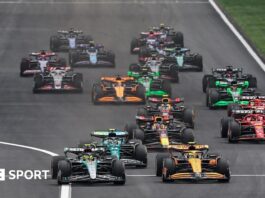 Lewis Hamilton leads Lando Norris into the first corner during the 2024 Chinese Grand Prix sprint race