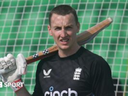 England batter Harry Brook rests his bat on his shoulder in training