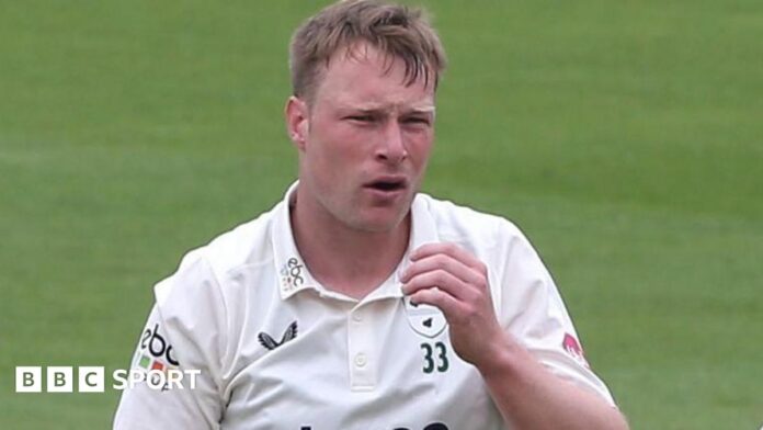 Matthew Waite exchanges pleasantries with Surrey's former Warwickshire and England opener Dom Sibley at The Oval last season