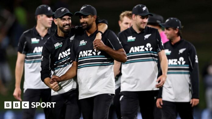 New Zealand's Daryl Mitchell and Ish Sodhi celebrate beating Pakistan