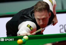 Judd Trump takes a shot at the Players Championship