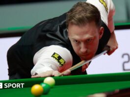 Judd Trump takes a shot at the Players Championship