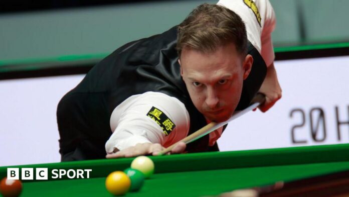 Judd Trump takes a shot at the Players Championship