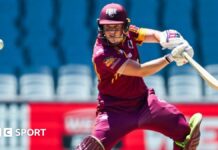 Quensland Fire player Grace Harris square cuts during a game against South Australia